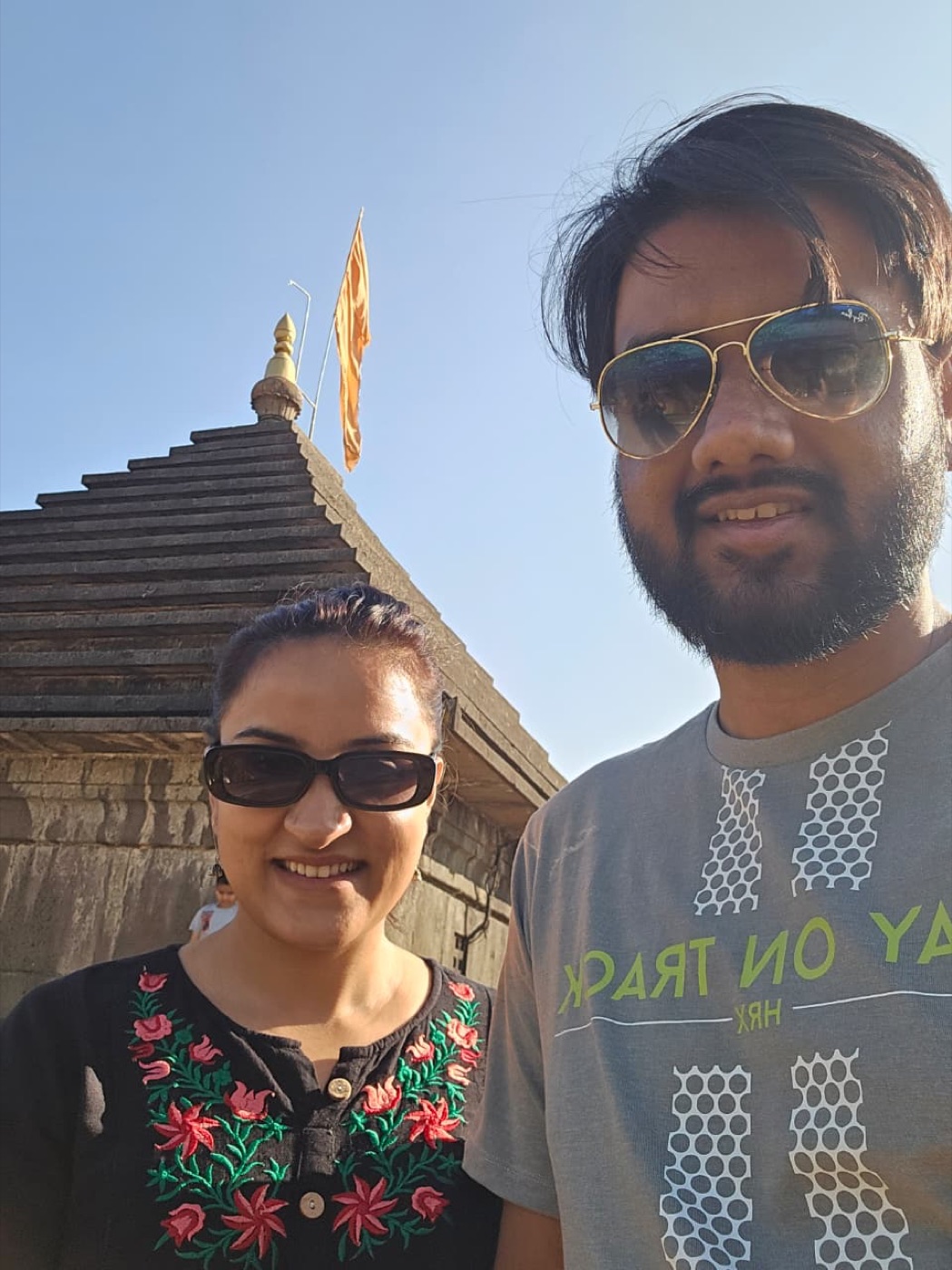 Divya and Tushar smiling